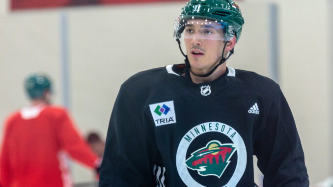 Jared_Spurgeon_at_Minnesota_Wild_open_practice_at_Tria_Rink_in_St_Paul,_MN
